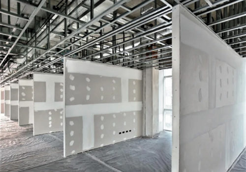 Servicios-Drywall-una-pared-acabado-fierros-Constructora1000Oficios